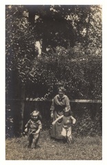 Margaret Sawyer with daughters Ruth and Gertrude playing outdoors, Brisbane, Australia