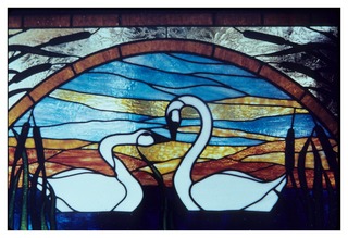 Stained glass window designed by Henry Swan