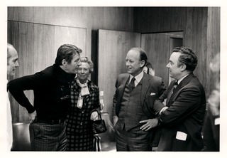 Fredrickson with Christian B. Anfinsen, Jr., Henrietta Fredrickson, and Joseph A. Califano, Jr.