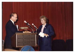 Donald Fredrickson introducing Department of Health and Human Services Secretary Patricia Harris in the Lister Hill Auditorium, National Institutes of Health