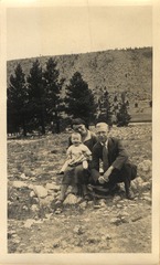 Fredrickson at one year of age with his mother and father