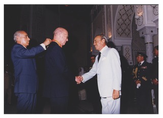 Donald S. Fredrickson being decorated by the King of Morocco