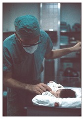 Doctor checking on baby