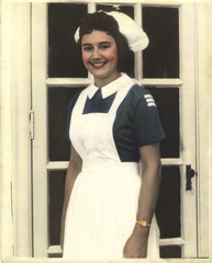 [Nurse wearing uniform from Antigua]