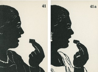 [A woman eating a piece of candy]