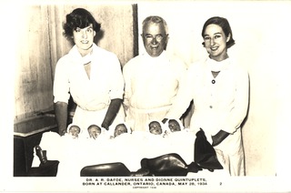 Dr. A. R. Dafoe, nurses and Dionne quintuplets, born at Callander, Ontario, Canada, May 28, 1934