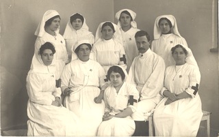 [Group of nine nurses and a doctor]
