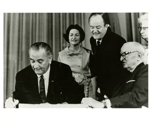 [President Lyndon Johnson signs the 1965 Medicare bill 3]
