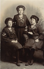 [Group portrait of three nurses]