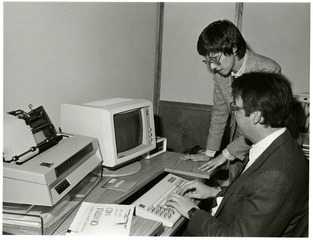 [Office of Computer and Communications Systems staff configuring Grateful Med]