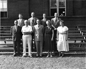 [Frank B. Rogers stands with division chiefs in front of the Army Medical Library]