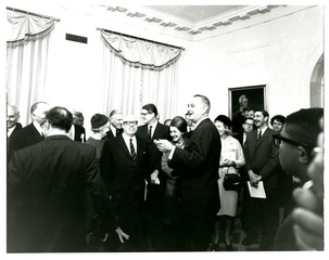 [President Lyndon Johnson with guests in the White House]