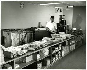 [Sorting mail at the National Library of Medicine]