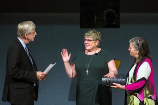 [National Institutes of Health Director Francis S. Collins swears in Patricia Flatley Brennan as the 19th director of the library]