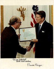Louis Sokoloff receiving a Senior Executive Service Presidential Rank Award from President Ronald Reagan