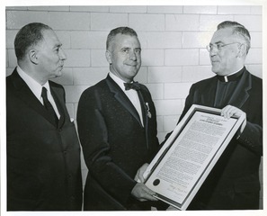 John E. Fogarty receiving citation and the first Veritas Medal from Providence College