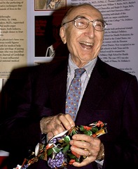 Michael DeBakey opening and displaying his gift at his 90th birthday party at NLM (image 1)