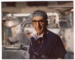 Michael DeBakey in surgical scrubs at Methodist Hospital, operating room in background