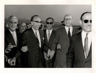 Michael DeBakey with his hosts at an airport in Beirut, Lebanon