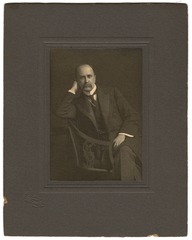 Portrait of William Osler sitting sideways in chair